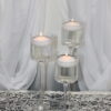 Stemmed Glass Floating Candle holders w/ candle (set of 3)